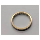 2 gold bands, not sure what purity the metal is.