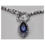.925/sterling silver necklace with blue center stone and CZ drop pendant