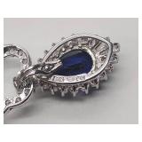 .925/sterling silver necklace with blue center stone and CZ drop pendant