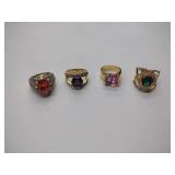 4 .925/sterling silver rings with colored center stones