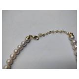 2 pearl necklaces. 17” and 20” 1 is marked Bold Elegance