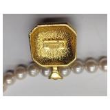 2 pearl necklaces. 17” and 20” 1 is marked Bold Elegance