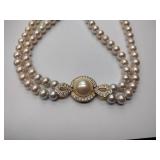 2 pearl necklaces. 17” and 20” 1 is marked Bold Elegance
