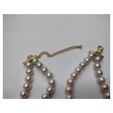 2 pearl necklaces. 17” and 20” 1 is marked Bold Elegance