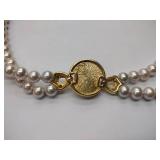 2 pearl necklaces. 17” and 20” 1 is marked Bold Elegance