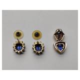 .925/sterling silver pierced earrings and necklace pendant with center blue gem stone