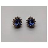 .925/sterling silver pierced earrings and necklace pendant with center blue gem stone