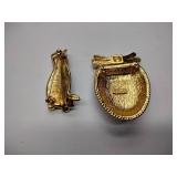 8 broaches, 1 necklace pendant, and 1 set of earrings