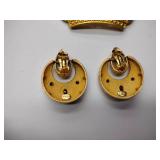 8 broaches, 1 necklace pendant, and 1 set of earrings