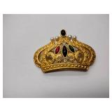 8 broaches, 1 necklace pendant, and 1 set of earrings