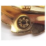 8 broaches, 1 necklace pendant, and 1 set of earrings