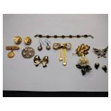 7 vintage broaches, 3 sets of earrings, and 1 bracelet