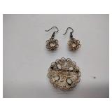 7 vintage broaches, 3 sets of earrings, and 1 bracelet