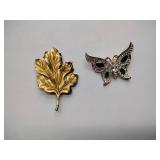 7 vintage broaches, 3 sets of earrings, and 1 bracelet