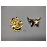 7 vintage broaches, 3 sets of earrings, and 1 bracelet