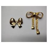 7 vintage broaches, 3 sets of earrings, and 1 bracelet