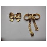 7 vintage broaches, 3 sets of earrings, and 1 bracelet