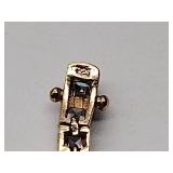 (2) .925/sterling silver 7” tennis bracelets  and 1 set of cz .925/sterling silver pierced hoop earrings