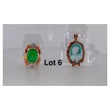 Two 10K Gold necklace pendants one with diamonds