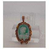 Two 10K Gold necklace pendants one with diamonds