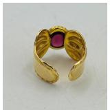 14k Vior Italy w/possible garnet stone size 6 ½ weighs 4 grams