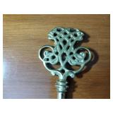 Williamsburg Virginia MetalCrafters: (2) 1999 trivets; 2001 door stop; Skelton key