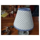 Country pcs: 9 plates, wall sconce; cheese strainer; tin candle holder; tin crimped base lamp w/shade