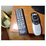 Insignia TV and Panasonic DVD player with remotes.
