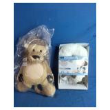 Health Touch Neck Massager with a dog design, featuring relaxing vibration and a Lion Stuffed Animal - Unused