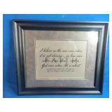 Framed piece of Christian wall art featuring an inspirational message.