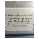 Framed piece of Christian wall art featuring an inspirational message.
