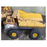 Three Vintage Tonka Dump Trucks