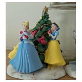 Assorted Disney Figurines and Globes including Disney Snow White, Cinderella, and Sleeping Beauty Christmas Tree