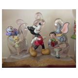 Assorted Disney Figurines and Globes including Disney Snow White, Cinderella, and Sleeping Beauty Christmas Tree