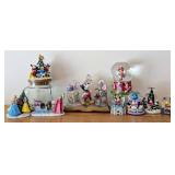 Assorted Disney Figurines and Globes including Disney Snow White, Cinderella, and Sleeping Beauty Christmas Tree