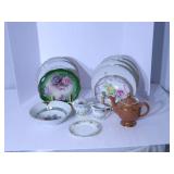 Vintage plates, teapot, and sugar a...