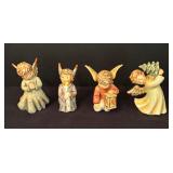 Four Angelic Hummel Figurines including Flying High, Angelic Guide, Light Up the Night and Peace on Earth