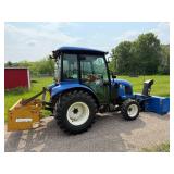 New Holland Tractor with King Kutter Box Blade Attachment and Snow Blower Attachment