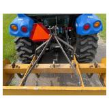 New Holland Tractor with King Kutter Box Blade Attachment and Snow Blower Attachment