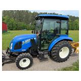 New Holland Tractor with King Kutter Box Blade Attachment and Snow Blower Attachment