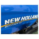 New Holland Tractor with King Kutter Box Blade Attachment and Snow Blower Attachment