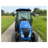 New Holland Tractor with King Kutter Box Blade Attachment and Snow Blower Attachment