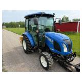 New Holland Tractor with King Kutter Box Blade Attachment and Snow Blower Attachment