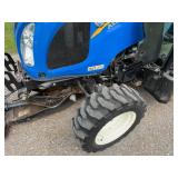 New Holland Tractor with King Kutter Box Blade Attachment and Snow Blower Attachment