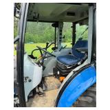 New Holland Tractor with King Kutter Box Blade Attachment and Snow Blower Attachment