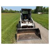 Used Bobcat Skid Steer Loader with Bucket Attachment