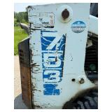 Used Bobcat Skid Steer Loader with Bucket Attachment