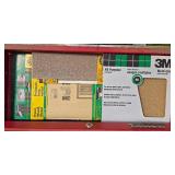 Mixed Collection of Hand Tools and Sandpaper in Red Tool Box