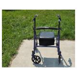 Drive Medical Four-Wheel Rollator Walker with Seat and Storage Pouch