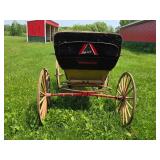 Antique Horse-Drawn Buggy with Wooden Wheels